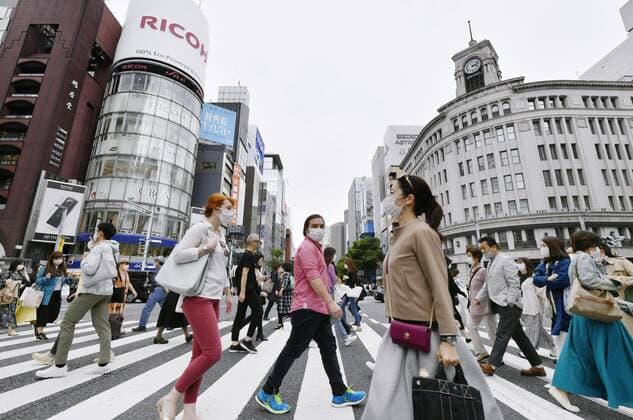 Golden Week holiday period in Japan amid pandemic People wearing masks to protect against the novel coronavirus walk in Tokyo s Ginza area on May 1, 2021, the first of five consecutive vacation days in the Golden Week holiday period. 