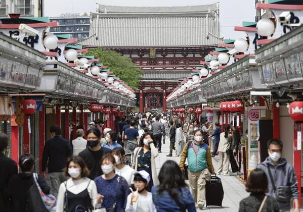 Golden Week holiday period in Japan amid pandemic People wearing masks to protect against the novel coronavirus walk in Tokyo s Asakusa area on May 1, 2021, the first of five consecutive vacation days in the Golden Week holiday period. 