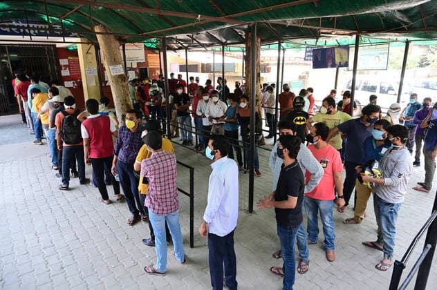 May 1, 2021, Prayagraj, Uttar Pradesh, India: Prayagraj: People line up while waiting to receive a dose of the Covaxin coronavirus vaccine, outside the Tej Bahadur Sapru District hospital in Allahabad on May 1, 2021 during the first day of India s vaccination drive to all adults. Prayagraj India - ZUMAv115 20210501_zap_v115_044 Copyright: xPrabhatxKumarxVermax