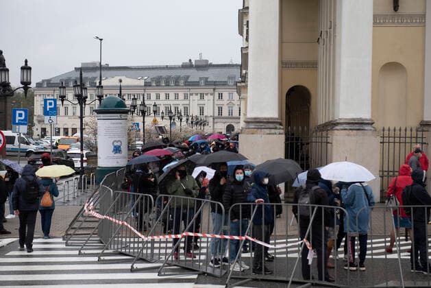 May 1, 2021, Warsaw, Warsaw, Poland: People form a queue in front of the Warsaw City Hall to get their vaccine against Covid-19 on May 1, 2021 in Warsaw, Poland. People which are 30 years and older and have been previously registered to get their vaccine can get their shot without appointment from May 1 to May 3 in sixteen Polish cities in mobile vaccination spots. In the mobile vaccination spots Johnson & Johnson vaccine is administered. Warsaw Poland - ZUMAk156 20210501_zip_k156_003 Copyright: xAleksanderxKalkax