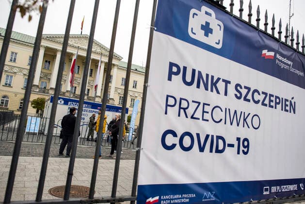 May 1, 2021, Warsaw, Poland: People queue to the entrance of the mobile vaccination point at the City Hall in Warsaw..During the long May weekend where 3rd of May is holiday in Poland, mobile vaccination points are organized in each voivodeship capitol city without prior registration everyone will be able to get vaccinated against COVID-19. In Warsaw outside the City Hall where the Mobile Vaccination Point is placed, thousands of people queued from early morning to get a jab. Warsaw Poland - ZUMAs197 20210501_zaa_s197_012 Copyright: xAttilaxHusejnowx