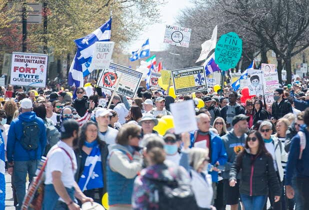 May 1, 2021, Montreal, PQ, Canada: People take part in a demonstration opposing the Quebec governmentÃ¢â‚¬â ¢s measures to help curb the spread of COVID-19 in Montreal, Saturday, May 1, 2021. Montreal Canada  - ZUMAc35_ 20210501_zaf_c35_043 Copyright: xGrahamxHughesx