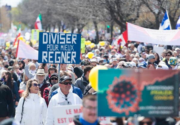 May 1, 2021, Montreal, PQ, Canada: People take part in a demonstration outside the Olympic Stadium opposing the Quebec governmentÃ¢â‚¬â ¢s measures to help curb the spread of COVID-19 in Montreal, Saturday, May 1, 2021. Montreal Canada  - ZUMAc35_ 20210501_zaf_c35_045 Copyright: xGrahamxHughesx