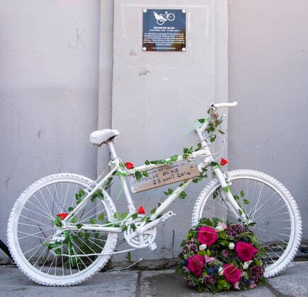 May 2, 2021, Montreal, PQ, Canada: A white bicycle and plaque in memory of Mathilde Blais is shown following a ceremony in Montreal, Sunday, May 2, 2021. Blais was killed at this spot in 2014 and the bike has been donated to the Museum of Civilization in Quebec City. Montreal Canada  - ZUMAc35_ 20210502_zaf_c35_009 Copyright: xGrahamxHughesx