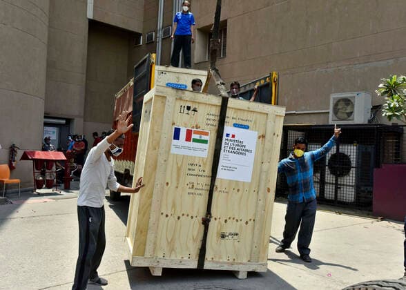 NEW DELHI, INDIA - MAY 2: Oxygen generator and a High-Pressure filling system donated by the Govt. of France to BLK-Max Hospital, being unloaded, on May 2, 2021 in New Delhi, India. (Photo by Sanjeev Verma Hindustan Times ) Daily Life Amid Coronavirus Pandemic In India