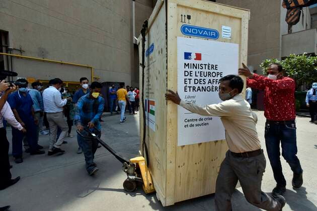 NEW DELHI, INDIA - MAY 2: Oxygen generator and a High-Pressure filling system donated by the Govt. of France to BLK-Max Hospital, being unloaded, on May 2, 2021 in New Delhi, India. (Photo by Sanjeev Verma Hindustan Times ) Daily Life Amid Coronavirus Pandemic In India