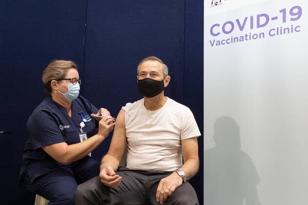 MARK MCGOWAN COVID19 VACCINATION, Western Australia Health Minister Roger Cook is seen receiving his first dose of the COVID-19 AstraZeneca vaccination in Perth, Monday, May 2, 2021. West Australian Premier Mark McGowan has received a coronavirus vaccination as the state waits to learn whether more local cases have been detected. ( NO ARCHIVING, EDITORIAL USE ONLY, NO USE IN BOOKS WITHOUT CONSENT PERTH WA AUSTRALIA  Copyright: xRICHARDxWAINWRIGHTx 20210503001539404210