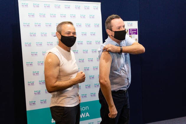 MARK MCGOWAN COVID19 VACCINATION, WA Premier Mark McGowan and Western Australia Health Minister Roger Cook pose for a photograph after receiving their first dose of the COVID-19 AstraZeneca vaccination in Perth, Monday, May 2, 2021. West Australian Premier Mark McGowan has received a coronavirus vaccination as the state waits to learn whether more local cases have been detected. ( NO ARCHIVING, EDITORIAL USE ONLY, NO USE IN BOOKS WITHOUT CONSENT PERTH WA AUSTRALIA  Copyright: xRICHARDxWAINWRIGHTx 20210503001539404299