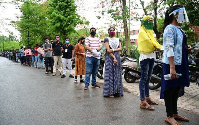 May 3, 2021, Prayagraj, Uttar Pradesh, India: Prayagraj: Youth wait in a queue to take first dose of the Covaxin coronavirus vaccine, at Moti Lal Nehru Medical College in Allahabad on May, 2021 during India s vaccination drive to all adults. Prayagraj India - ZUMAv115 20210503_zap_v115_013 Copyright: xPrabhatxKumarxVermax