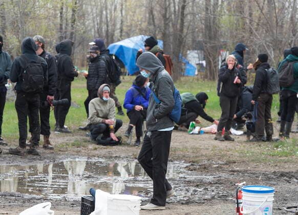 May 3, 2021, Montreal, PQ, Canada: People gather at a homeless camp in the east end of Montreal, Monday, May 3, 2021. Authorities have ordered the camp to be taken down. Montreal Canada  - ZUMAc35_ 20210503_zaf_c35_004 Copyright: xRyanxRemiorzx