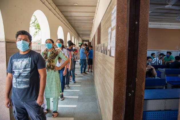 May 3, 2021, New Delhi, India: People in a queue wait to be vaccinated at the Sarvoday Kanya Vidyalay West Vinod Nagar where a temporary vaccination centre has been converted..Third phase of Covid-19 Mass Vaccination Drive for People above 18 begins in Delhi capital of India. According to Delhi Deputy Chief Minister Manish Sisodia. 301 Vaccination centres set-up in 76 schools across Delhi, Vaccinating Today 45,100 Delhi Citizens, Next few days 3000 Vaccination centres will start operating in 300 schools across Delhi. New Delhi India - ZUMAs197 20210503_zaa_s197_054 Copyright: xPradeepxGaurx