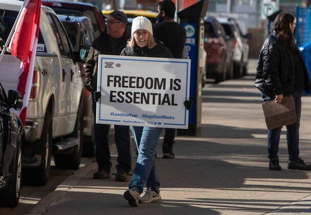 May 3, 2021, EDMONTON, ab, Canada: Supporters of Pastor James Coates protest outside the courthouse as his trial begins in Edmonton, Alta, on Monday May 3, 2021. Coates of GraceLife Church spent a month in jail for violating a bail condition not to hold church services that officials have said ignored measures on capacity limits, physical distancing and masking. EDMONTON Canada  - ZUMAc35_ 20210503_zaf_c35_047 Copyright: xJasonxFransonx