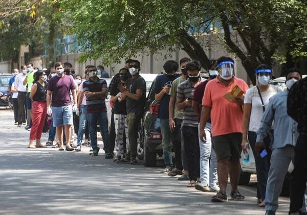 NEW DELHI, INDIA - MAY 3: People queue during the third phase of vaccination, at Ishani Sarvodaya Kanya Vidyalaya school on May 3, 2021 in New Delhi, India. (Photo by Amal KS Hindustan Times) COVID-19 Vaccination Drive
