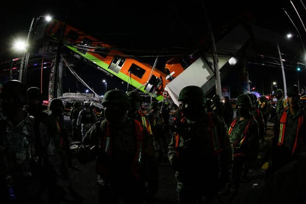 (210504) -- MEXICO CITY, May 4, 2021 -- Rescuers work at the scene of a metro bridge collapse in Mexico City, Mexico, May 3, 2021. At least 13 people have been killed and 70 others were injured after a metro bridge collapsed in southern Mexico City Monday night, local authorities said. (Photo by Xinhua) MEXICO-MEXICO CITY-METRO BRIDGE COLLAPSE FranciscoxCanedo 