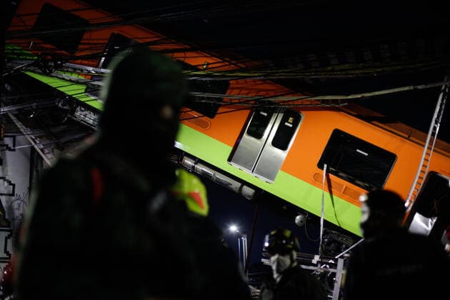 (210504) -- MEXICO CITY, May 4, 2021 -- Rescuers work at the scene of a metro bridge collapse in Mexico City, Mexico, May 4, 2021. At least 13 people have been killed and 70 others were injured after a metro bridge collapsed in southern Mexico City Monday night, local authorities said. (Photo by Xinhua) MEXICO-MEXICO CITY-METRO BRIDGE COLLAPSE FranciscoxCanedo 