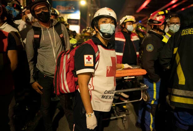 (210504) -- MEXICO CITY, May 4, 2021 -- Rescuers work at the scene of a metro bridge collapse in Mexico City, Mexico, May 3, 2021. At least 15 people were killed and 70 others injured after a metro bridge collapsed in southern Mexico City Monday night, according to an updated preliminary report from local authorities. David de la Paz) (SPOT NEWS)MEXICO-MEXICO CITY-METRO BRIDGE COLLAPSE DxAviddelapaz 