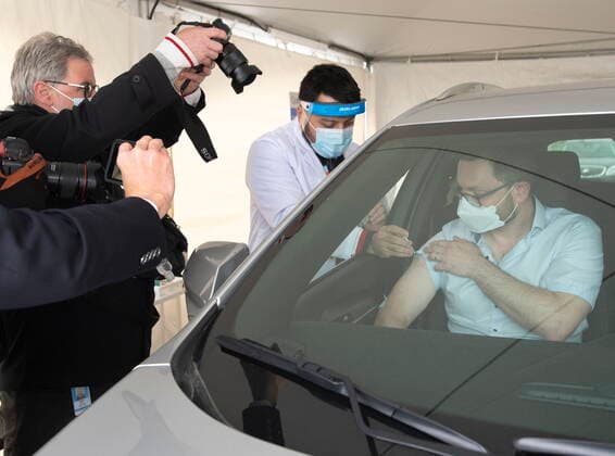 May 4, 2021, Montreal, PQ, Canada: Timur Tchanychev gets a COVID-19 vaccine at a demonstration of a drive-through vaccination site, Tuesday, May 4, 2021 in Montreal. The site will be able to give 4,000 doses a day. Montreal Canada  - ZUMAc35_ 20210504_zaf_c35_002 Copyright: xRyanxRemiorzx