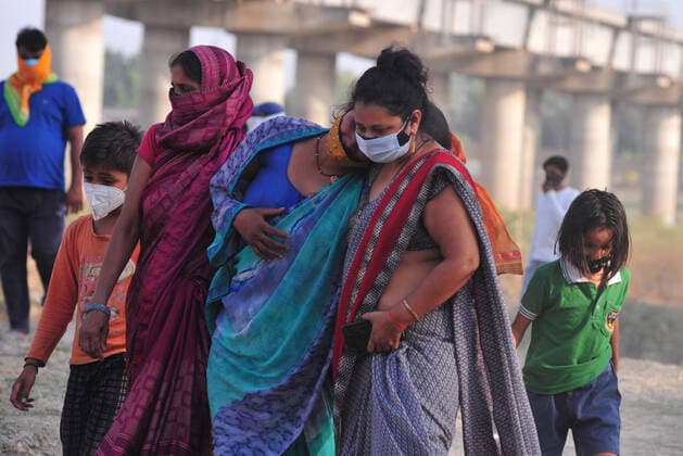 Coronavirus Emergency In India Mourn relatives return after performing the last rites of a victim who died of COVID-19 coronavirus , at a mass crematorium site , on the banks of Ganges River amid Covid -19 pandemic , in Allahabad on May 4,2021 . Allahabad India shukla-notitle210504_npJqU  Copyright: xRiteshxShuklax