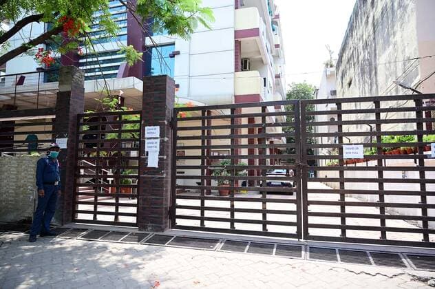 May 5, 2021, Prayagraj, Uttar Pradesh, India: Prayagraj: Security guard stand outside a Private COVID19 Hospital displaying Ã¢â‚¬oeNo Bed AvailableÃ¢â‚¬Â in Prayagraj on Wednesday, May 05, 2021. Prayagraj India - ZUMAv115 20210505_zap_v115_005 Copyright: xPrabhatxKumarxVermax