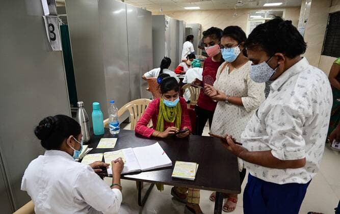 May 5, 2021, Prayagraj, Uttar Pradesh, India: Prayagraj: People over 18 year age fulfill formalities before get their first dose of Covid-19 vaccine at Moti Lal Nehru Medical College in Prayagraj on Wednesday, May 05, 2021. Prayagraj India - ZUMAv115 20210505_zap_v115_016 Copyright: xPrabhatxKumarxVermax
