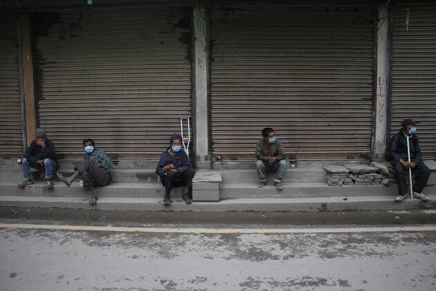 May 5, 2021, Kathmandu, NE, Nepal: People wait for the morning meal provided by the 100 s Group, a youth charity, during the lockdown in Kathmandu, Nepal, May 5, 2021. Kathmandu Nepal - ZUMAd164 20210505_zip_d164_006 Copyright: xAryanxDhimalx