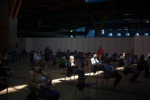 May 5, 2021, Malaga, Spain: People wearing face masks as a precaution against the spread of covid-19 seen waiting during a massive vaccination at Fair and Congresses Palace..Health regional authorities have retimed again the vaccination with doses of Pfizer BioNTech inside large and secure places following all protective measures, as part of massive vaccination One million plan after the announcement of Andalusian government to inoculate around 600.000 vaccines during the week. Malaga Spain - ZUMAs197 20210505_zaa_s197_024 Copyright: xJesusxMeridax