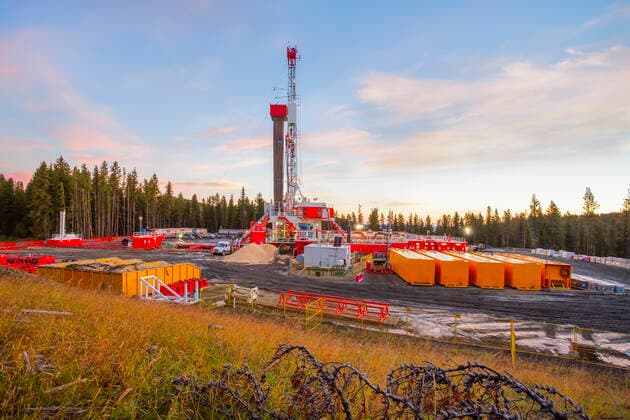 Triple rip drilling equipment on oil field at sunrise; Alberta, Canada  Copyright: LiteboxxProductions 33339971