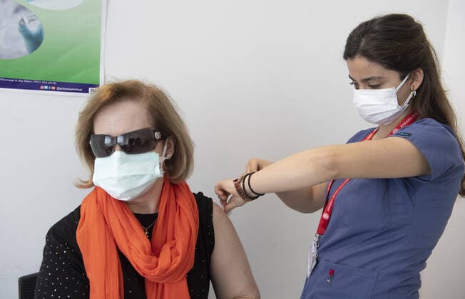 A woman receives the COVID-19 vaccine in Ankara, Turkey, on May 5, 2021. Turkey has confirmed 41,883 deaths and 4,955,594 positive cases of the coronavirus infection in the country. ( Copyright: AbdurrahmanxAntakyalix-xDepoxPho 17129923