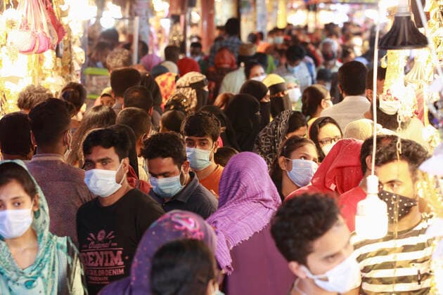 May 6, 2021, Dhaka, Bangladesh: Bangladeshi people throng a market without caring for physical distancing crucial for checking coronavirus (COVID-19) spread, in Dhaka, Bangladesh, May 6, 2021. The Bangladesh government allowed all stores and shopping malls to reopen altering the lockdown rules ahead of the Eid al-Fitr festival. Dhaka Bangladesh - ZUMAd117 20210506_zap_d117_024 Copyright: xSuvraxKantixDasx
