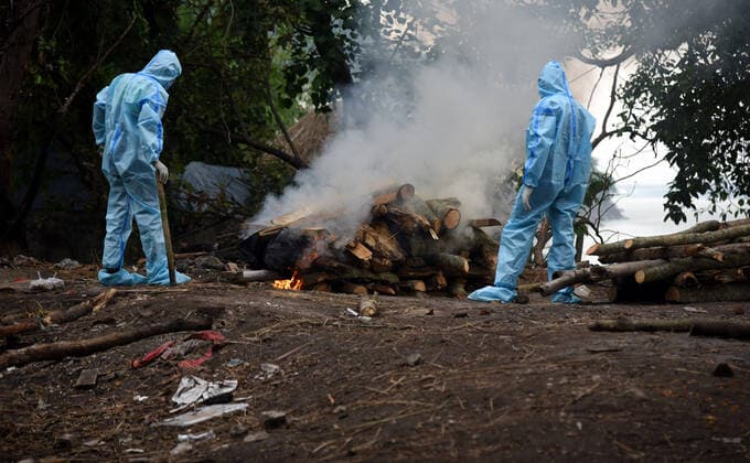 May 6, 2021, Guwahati, Assam, India: Last rites of a person who died due to COVID-19 disease is performed in Guwahati on Thursday 6th May 2021. Guwahati India - ZUMAd163 20210506_zip_d163_014 Copyright: xDasarathxDekax