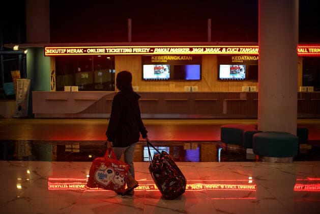 May 5, 2021, Merak, Banten, Indonesia: Quiet atmosphere in Merak Port, Banten, Thursday (6 5 2021) night. The flow of crossings at Merak Port has decreased due to the homecoming ban rules that came into force on May 6-17, 2021 to prevent the spread of COVID-19. Merak Indonesia - ZUMAz107 20210505_zip_z107_024 Copyright: xMuhammadxZaenuddinx