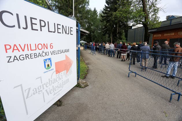 Tourism workers vaccination Tourism workes line up to get shots of vaccines against the coronavirus disease (COVID-19) during mass vaccination of tourism workers at Zagrebacki Velesajam hall in Zagreb, Croatia on May 6, 2021. About 70,000 people from the tourism sector will get opportunity to be vaccinated in next few weeks all over Croatia to try save tourist season. MarinxTironi PIXSELL