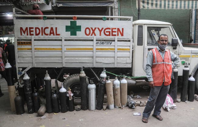 May 6, 2021, New Delhi, India: Empty oxygen cylinders seen in a queue waiting for refilling..Indian Supreme Court (Apex court) says that the country needs to be prepared for the third surge of Covid19 which could be more harmful for children. India has reported 412,431 new Covid-19 virus cases and 3,980 deaths in past 24 hours, the highest in a day so far. New Delhi India - ZUMAs197 20210506_zaa_s197_204 Copyright: xNaveenxSharmax