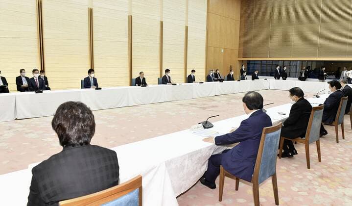 Extension of COVID-19 state of emergency in Japan A coronavirus task force meeting is held at the prime minister s office in Tokyo on May 7, 2021. Japanese Prime Minister Yoshihide Suga announced the expansion of the COVID-19 state of emergency beyond Tokyo and the Osaka region and its extension through the end of the month. 