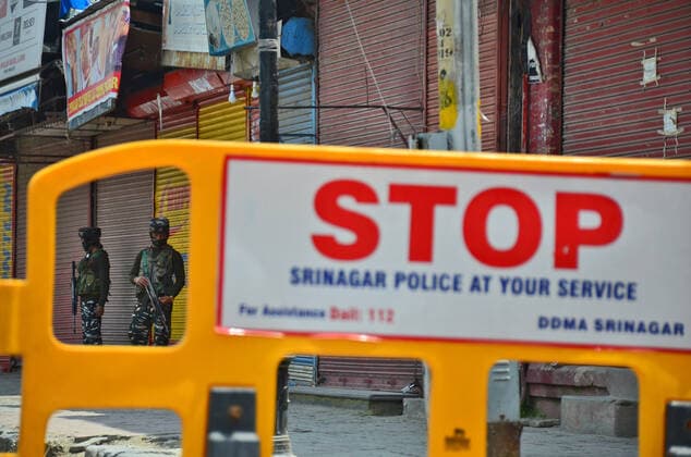 May 7, 2021, Srinagar, India: Paramilitary troopers stand alert at a closed market during a lockdown imposed by the authorities following the surge in coronavirus cases in Srinagar..Normal life remained affected in Jammu and Kashmir on the ninth day of the last Friday of Ramadan with the imposition of lockdown following an alarming surge in coronavirus cases. India reported a record daily rise in coronavirus cases of 414,188, while deaths from COVID-19 swelled by 3,915 in the last 24 hours. Srinagar India - ZUMAs197 20210507_zaa_s197_019 Copyright: xSaqibxMajeedx