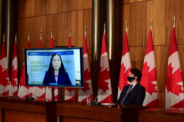 May 7, 2021, Ottawa, on, Canada: Chief Public Health Officer Dr. Theresa Tam speaks virtually as Prime Minister Justin Trudeau looks on during a press conference to update Canadians on the COVID-19 pandemic, in Ottawa on Friday, May 7, 2021. Ottawa Canada  - ZUMAc35_ 20210507_zaf_c35_018 Copyright: xSeanxKilpatrickx