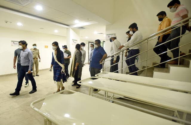 NOIDA, INDIA - MAY 7: Noida Authority CEO Ritu Maheshwari took stock of the Covid-19 Hospital being built in the shooting range located at Sector-21A Noida Stadium on May 7, 2021 in Noida, India. (Photo by Sunil Ghosh Hindustan Times) New 50-Bed COVID Care Facility At Noida