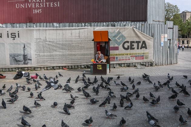 May 7, 2021, Istanbul, Turkey: A man seen selling birdseeds at Eminonu Square during the lockdown..The Turkish government has approved full closure, which will last until May 17, to reduce rising coronavirus cases. Istanbul Turkey - ZUMAs197 20210507_zaa_s197_094 Copyright: xHakanxAkgunx