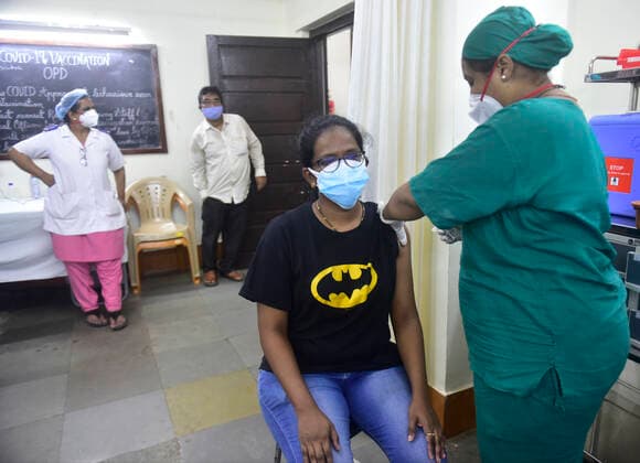 MUMBAI, INDIA - MAY 7: A medic administers a dose of Covid-19 vaccine to a beneficiary at Nair Hospital, on May 7, 2021 in Mumbai, India. (Photo by Anshuman Poyrekar Hindustan Times) COVID-19 Vaccination Drive