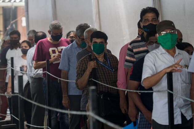 MUMBAI, INDIA - MAY 7: People lined up to get vaccinated against Covid-19 at Rajawadi Hospital, Ghatkopar, on May 7, 2021 in Mumbai, India. (Photo by Pratik Chorge Hindustan Times) COVID-19 Vaccination Drive