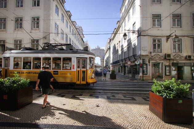 May 7, 2021, Lisbon, Lisbon, Portugal: People walk near a Tramway line in Baixa District area, Lisbon..According to data provided by the General Health Direction (DGS), Portugal is complying responsibly with all control parameters of the COVID-19 pandemic as the number of infected and dead people has dropped drastically in the last weeks. Lisbon Portugal - ZUMAs197 20210507_zaa_s197_190 Copyright: xJorgexCastellanosx