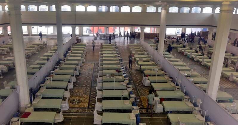 NEW DELHI, INDIA - MAY 9: Sri Guru Tegh Bahadar Covid care centre (300 Beds) ready for covid-19 patients at Gurdwara Rakab Ganj Sahib, on May 9, 2021 in New Delhi, India. The facility will provide free of cost medication, ambulance service, oxygen cylinders and concentrators, for the Covid-19 patients. (Photo by Sanjeev Verma Hindustan Times ) Covid Care Facility At Gurdwara Rakab Ganj Sahib