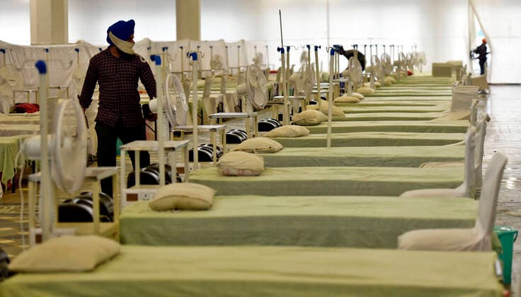 NEW DELHI, INDIA - MAY 9: Sri Guru Tegh Bahadar Covid care centre (300 Beds) ready for covid-19 patients at Gurdwara Rakab Ganj Sahib, on May 9, 2021 in New Delhi, India. The facility will provide free of cost medication, ambulance service, oxygen cylinders and concentrators, for the Covid-19 patients. (Photo by Sanjeev Verma Hindustan Times ) Covid Care Facility At Gurdwara Rakab Ganj Sahib