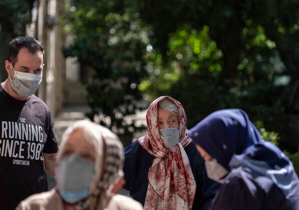 Vaccination Of People Over 80 Years By The China s Sinopharm COVID-19 Vaccine In Tehran An Iranian elderly woman wearing a protective face mask looks on as she arrives a heath center for receiving a dose of China s Sinopharm new coronavirus disease (COVID-19) vaccine in northern Tehran on May 10, 2021. MORTEZA NIKOUBAZL NurPhoto Tehran Tehran Iran nikoubazl-vaccinat210510_npNK2  Copyright: xMortezaxNikoubazlx