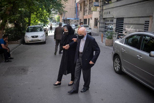 Vaccination Of People Over 80 Years By The China s Sinopharm COVID-19 Vaccine In Tehran An Iranian woman helps her elderly father while arriving a health center for receiving a dose of China s Sinopharm new coronavirus disease (COVID-19) vaccine in northern Tehran on May 10, 2021. MORTEZA NIKOUBAZL NurPhoto Tehran Tehran Iran nikoubazl-vaccinat210510_npWyc  Copyright: xMortezaxNikoubazlx
