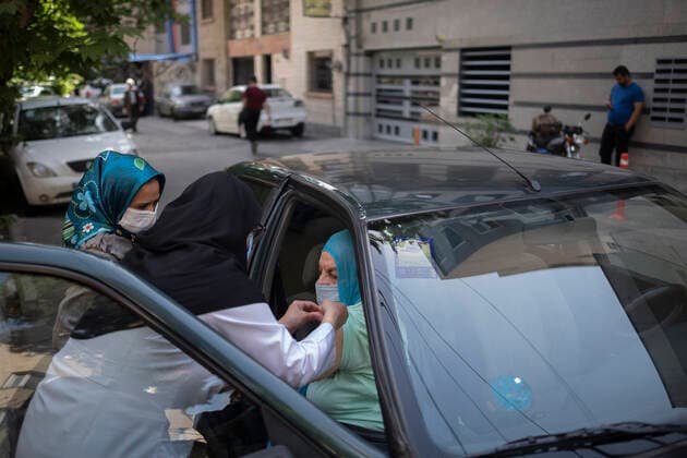 Vaccination Of People Over 80 Years By The China s Sinopharm COVID-19 Vaccine In Tehran An Iranian elderly woman receives a dose of China s Sinopharm new coronavirus disease (COVID-19) vaccine while sitting in a vehicle just out of a health center in northern Tehran on May 10, 2021. MORTEZA NIKOUBAZL NurPhoto Tehran Tehran Iran nikoubazl-vaccinat210510_npOrn  Copyright: xMortezaxNikoubazlx