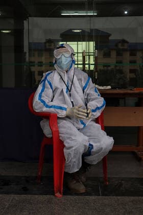 May 8, 2021: Portrait of a Health worker at a temporary Covid-19 hospital in Srinagar, Indian Administered Kashmir on 08 May 2021. A Local NGO Athrout has converted Hajj house into a 100-bedded Covid centre as the space in hospitals is filling up fast - ZUMAd99_ 20210508_zap_d99_062 Copyright: xMuzamilxMattoox