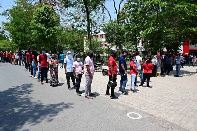 May 11, 2021, Prayagraj, Uttar Pradesh, India: Prayagraj: People over 18 year of age stand in queue to get a dose of COVID-19 vaccine at Moti Lal Nehru Medical college in Prayagraj on Tuesday, May 11, 2021. Prayagraj India - ZUMAv115 20210511_zap_v115_001 Copyright: xPrabhatxKumarxVermax