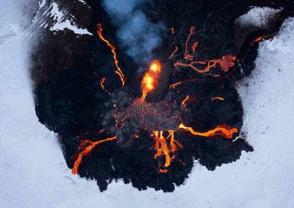 **VIDEO FOOTAGE AVAILABLE. CONTACT TO RECEIVE.** A photographer has captured a series of spectacular photos of an ongoing volcanic eruption near the city of Reykjavik in Iceland encapsulating the natural phenomenon?s beauty and destructive power. Erez Marom, a professional nature photographer, photography guide and traveller based in Israel, spent two weeks witnessing and documenting the Fagradalsfjall volcano eruption evolve from 1 fissure to a whopping 8 at its climax. His images show bubbling hot lava flowing out of the volcano which he captured using a drone. At one point during his visit, Erez states there were around 15-20 drones above the eruption at the same time. On the day of my first visit there was only Copyright: xx 41419447 EDITORIAL USE ONLY. NOT FOR USE BY NEWSPAPERS BASED IN THE UK.