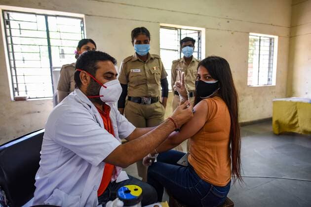 NEW DELHI, INDIA - MAY 11: A person being vaccinated against Covid-19 at Janakpuri on May 11, 2021 in New Delhi, India. (Photo by Amal KS Hindustan Times) COVID-19 Vaccination Drive